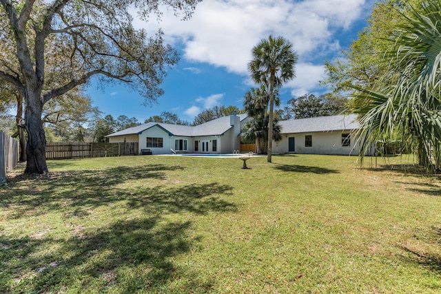 809 Main St, Destin, FL 32541 - view of yard featuring a fenced backyard and a fenced in pool