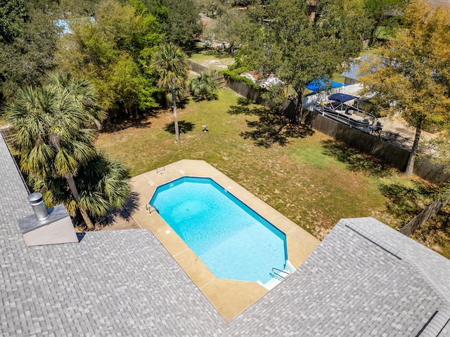 809 Main St, Destin, FL 32541 - view of swimming pool featuring a fenced backyard, a fenced in pool, a patio, and a lawn