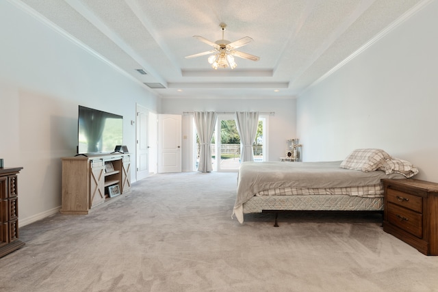 809 Main St, Destin, FL 32541 - bedroom featuring access to outside, a tray ceiling, a ceiling fan, visible vents, and light carpet