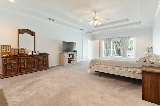 809 Main St, Destin, FL 32541 - bedroom with baseboards, crown molding, visible vents, a raised ceiling, and carpet