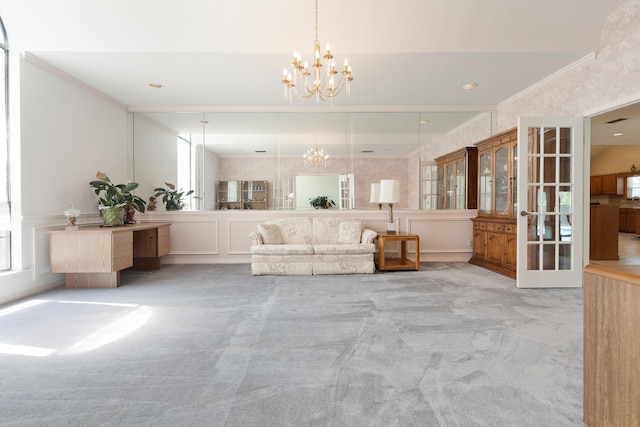 809 Main St, Destin, FL 32541 - carpeted living area with a chandelier and crown molding