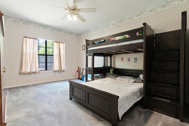 809 Main St, Destin, FL 32541 - bedroom featuring ceiling fan, carpet, a textured ceiling, wallpapered walls, and baseboards