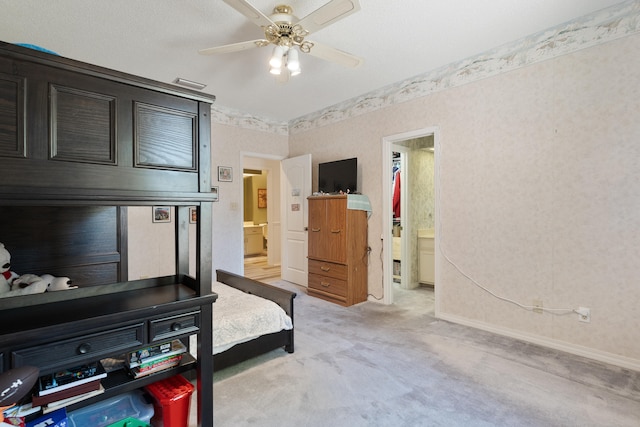 809 Main St, Destin, FL 32541 - bedroom with ensuite bathroom, visible vents, light carpet, wallpapered walls, and baseboards