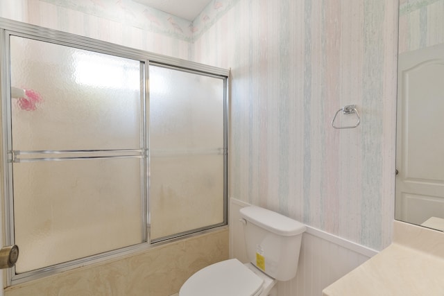 809 Main St, Destin, FL 32541 - full bathroom with toilet, wallpapered walls, and combined bath / shower with glass door