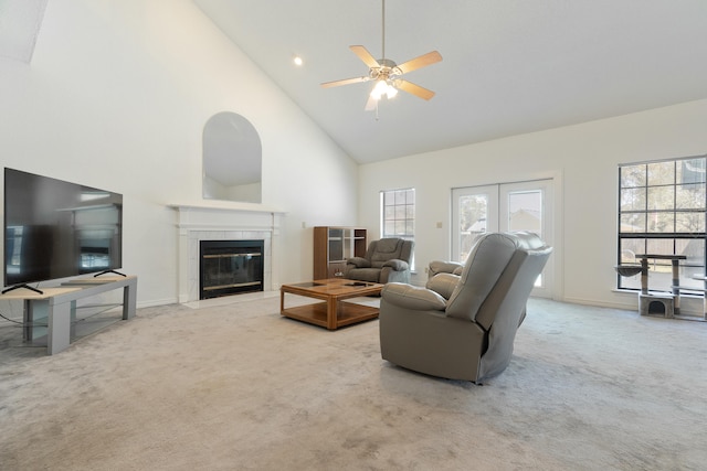 809 Main St, Destin, FL 32541 - living room with baseboards, a fireplace, carpet floors, ceiling fan, and high vaulted ceiling