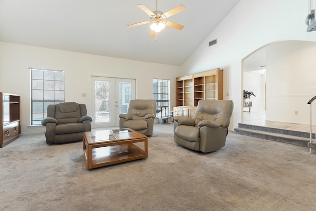 809 Main St, Destin, FL 32541 - living area featuring carpet flooring, visible vents, ceiling fan, high vaulted ceiling, and arched walkways