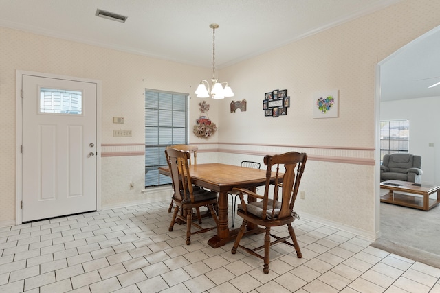 809 Main St, Destin, FL 32541 - dining space with a chandelier, wallpapered walls, and visible vents