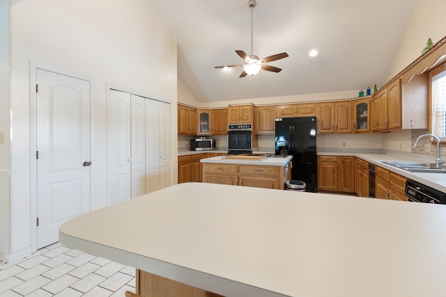 809 Main St, Destin, FL 32541 - kitchen with ceiling fan, glass insert cabinets, black appliances, light countertops, and a sink