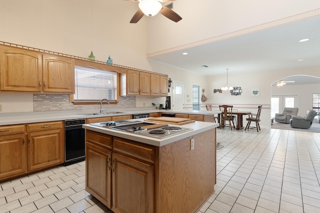 809 Main St, Destin, FL 32541 - kitchen with stovetop with downdraft, light countertops, a sink, and ceiling fan