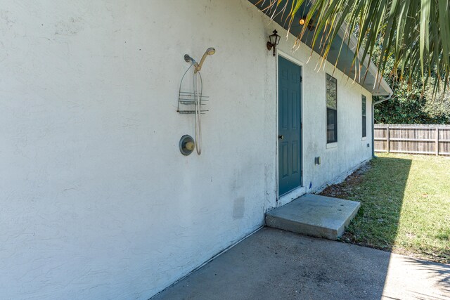 809 Main St, Destin, FL 32541 - entrance to property with stucco siding