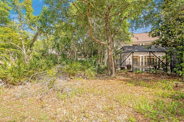 237 Matties Way, Destin, FL 32541 - view of yard featuring a lanai