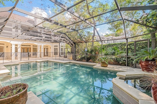 237 Matties Way, Destin, FL 32541 - view of swimming pool featuring a patio, a pool with connected hot tub, and glass enclosure