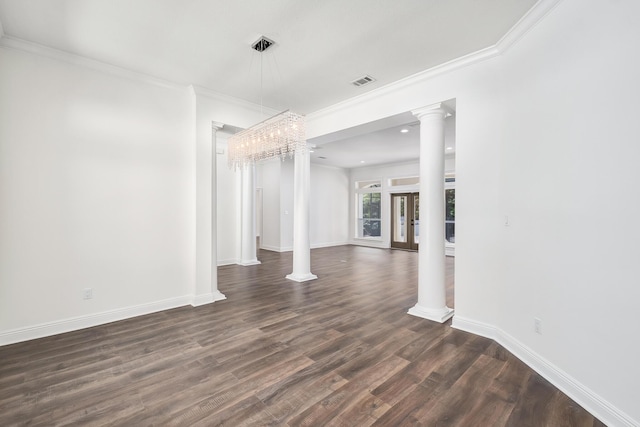 237 Matties Way, Destin, FL 32541 - unfurnished living room featuring ornamental molding, ornate columns, dark wood finished floors, baseboards, and a chandelier