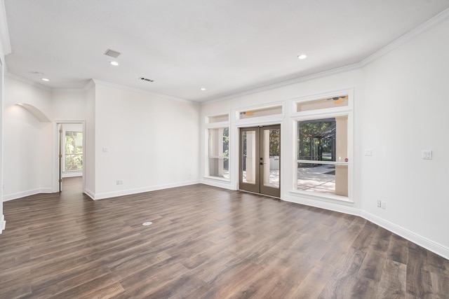 237 Matties Way, Destin, FL 32541 - empty room with crown molding, baseboards, dark wood-style floors, recessed lighting, and arched walkways