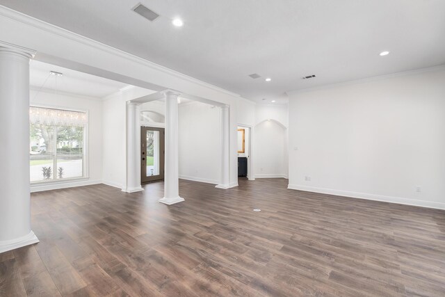 237 Matties Way, Destin, FL 32541 - unfurnished living room featuring decorative columns, ornamental molding, dark wood finished floors, recessed lighting, and baseboards