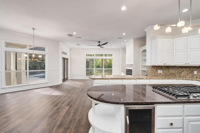 237 Matties Way, Destin, FL 32541 - kitchen featuring beverage cooler, stainless steel gas stovetop, a ceiling fan, a chandelier, and recessed lighting