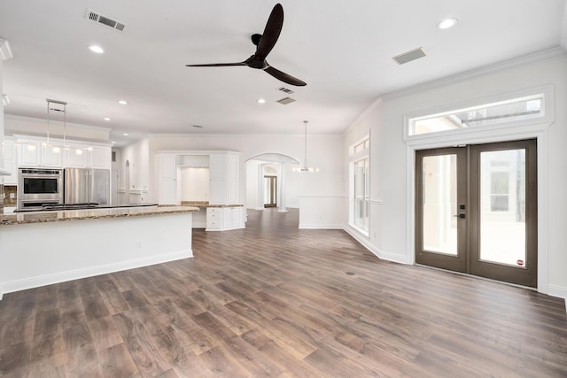 237 Matties Way, Destin, FL 32541 - kitchen with crown molding, stainless steel appliances, white cabinets, recessed lighting, and a ceiling fan