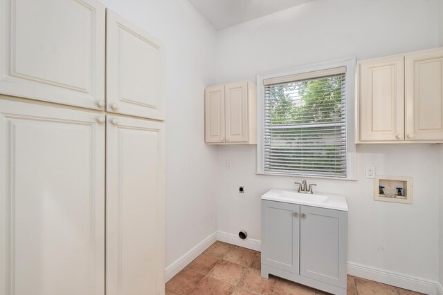 237 Matties Way, Destin, FL 32541 - washroom with hookup for an electric dryer, baseboards, hookup for a washing machine, and cabinet space