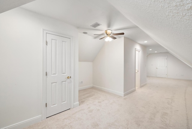 237 Matties Way, Destin, FL 32541 - additional living space featuring carpet, ceiling fan, baseboards, and vaulted ceiling