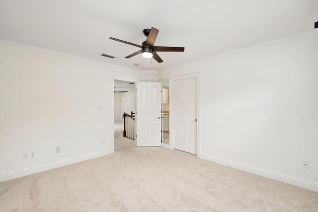 237 Matties Way, Destin, FL 32541 - unfurnished bedroom featuring light carpet, crown molding, baseboards, and a ceiling fan