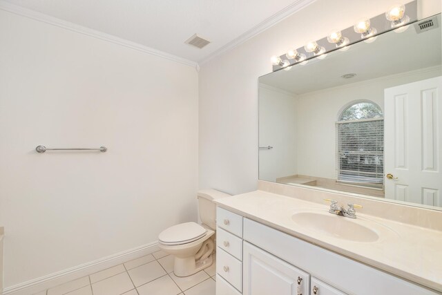 237 Matties Way, Destin, FL 32541 - bathroom with tile patterned floors, crown molding, toilet, vanity, and baseboards