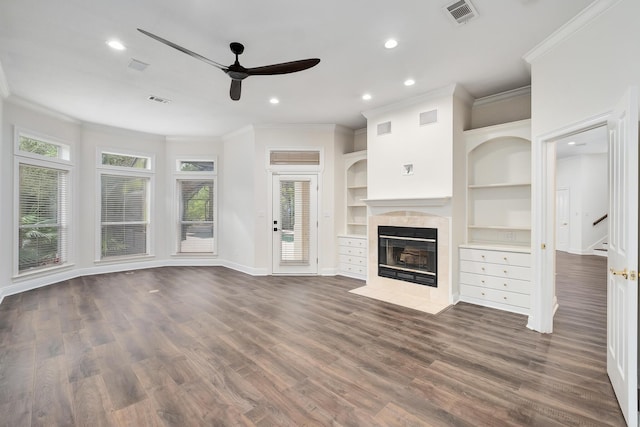 237 Matties Way, Destin, FL 32541 - unfurnished living room featuring ceiling fan, ornamental molding, a tile fireplace, recessed lighting, and baseboards