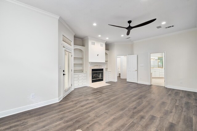 237 Matties Way, Destin, FL 32541 - unfurnished living room featuring crown molding, a ceiling fan, recessed lighting, baseboards, and a fireplace