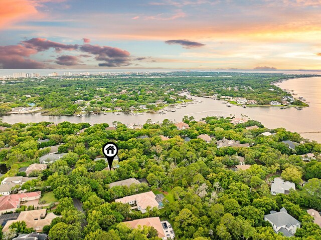 237 Matties Way, Destin, FL 32541 - aerial view of a large body of water and a tree filled landscape
