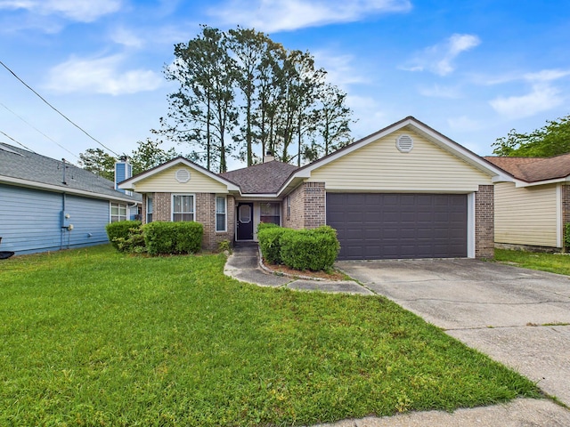 single story home featuring concrete driveway, a chimney, a front lawn, brick siding, and a garage