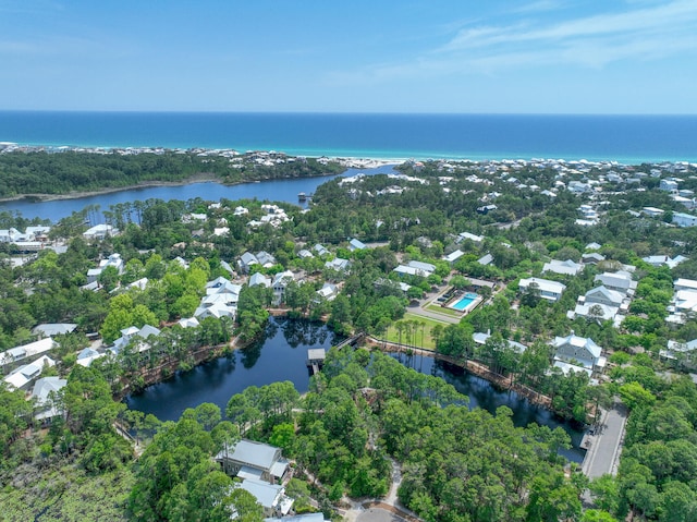 bird's eye view featuring a water view and a residential view