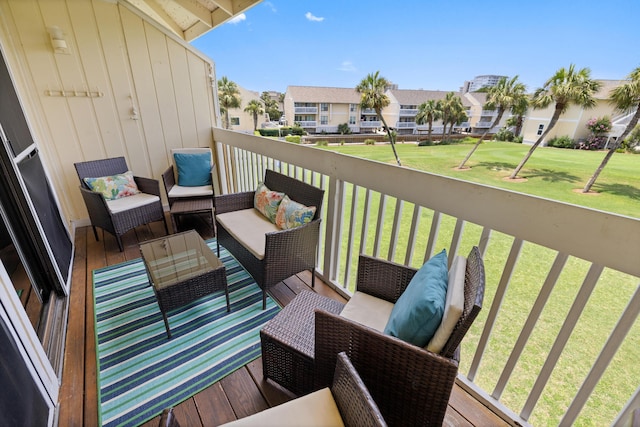 balcony with a residential view and outdoor lounge area