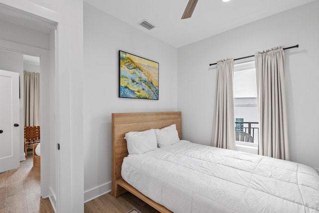 34 Gulf Breeze Ct, Destin, FL 32541 - bedroom with visible vents, ceiling fan, wood finished floors, and baseboards