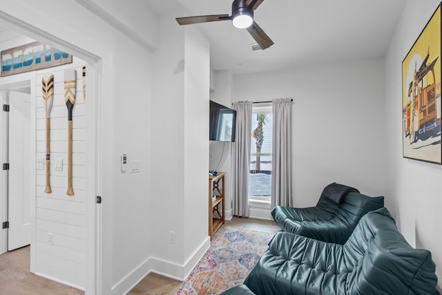 34 Gulf Breeze Ct, Destin, FL 32541 - sitting room with ceiling fan and wood finished floors