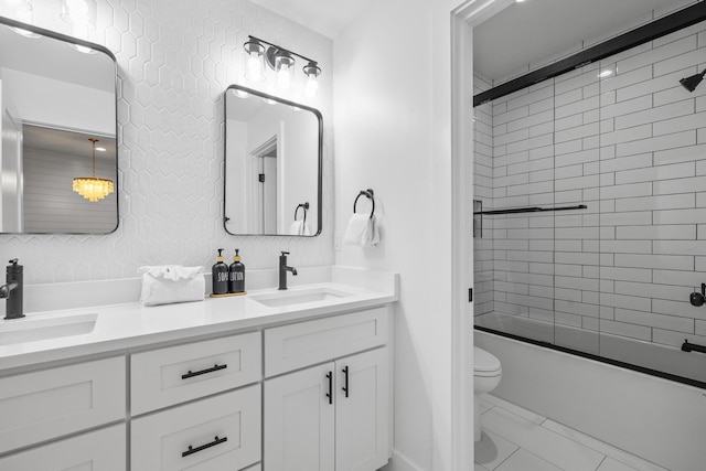 34 Gulf Breeze Ct, Destin, FL 32541 - bathroom with a sink, toilet, double vanity, and shower / bath combination with glass door