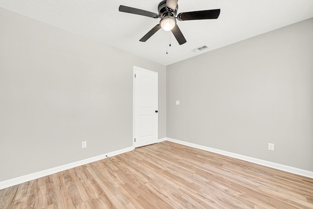 5700 Country Squire Dr, Milton, FL 32570 - empty room with light wood finished floors, visible vents, baseboards, and ceiling fan
