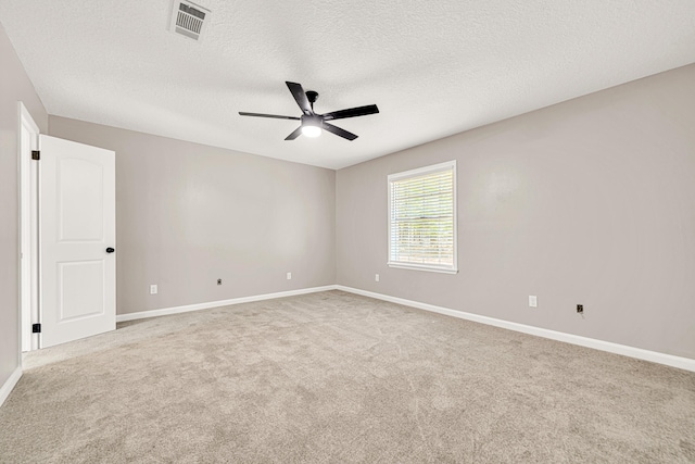 5700 Country Squire Dr, Milton, FL 32570 - carpeted empty room with visible vents, a textured ceiling, baseboards, and ceiling fan