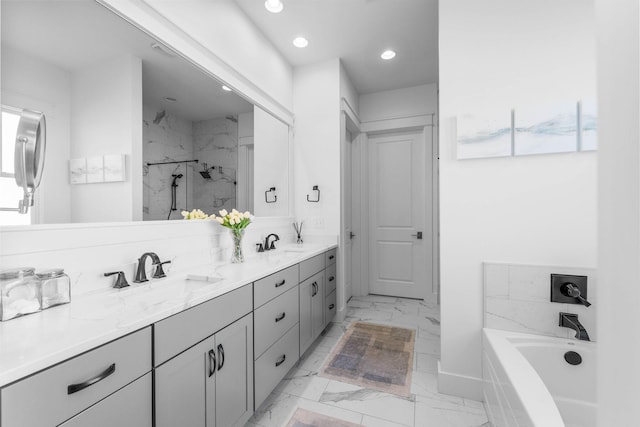 141 Sandchase Cir, Watersound, FL 32461 - full bathroom featuring marble finish floor, a sink, recessed lighting, and a marble finish shower