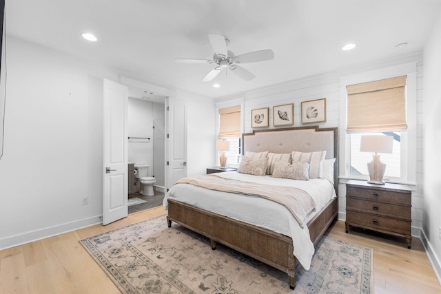 141 Sandchase Cir, Watersound, FL 32461 - bedroom with ensuite bathroom, light wood-style flooring, recessed lighting, and baseboards