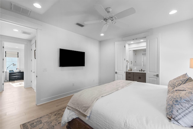 141 Sandchase Cir, Watersound, FL 32461 - bedroom featuring visible vents, recessed lighting, and light wood-style floors