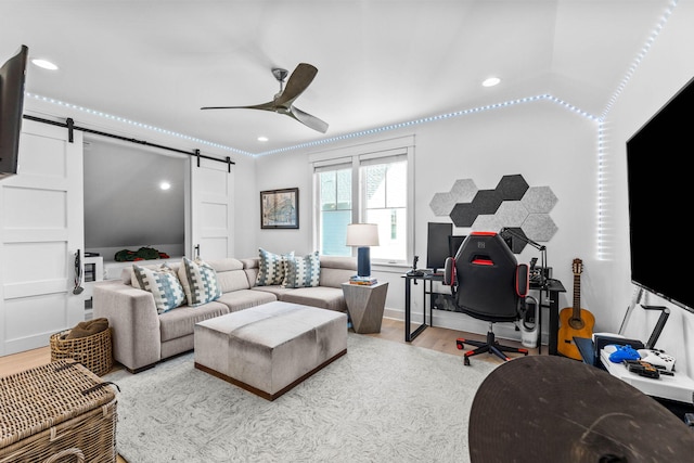 141 Sandchase Cir, Watersound, FL 32461 - living room featuring ceiling fan, recessed lighting, a barn door, and wood finished floors