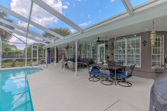 4030 Indian Trl, Destin, FL 32541 - view of swimming pool with ceiling fan, outdoor lounge area, glass enclosure, a patio area, and fence