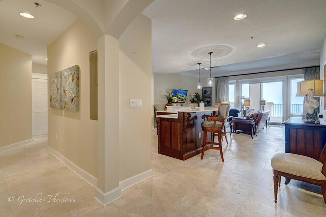 11807 Front Beach Rd Unit 2104, Panama City Beach, FL 32407 - hallway with baseboards, arched walkways, and recessed lighting