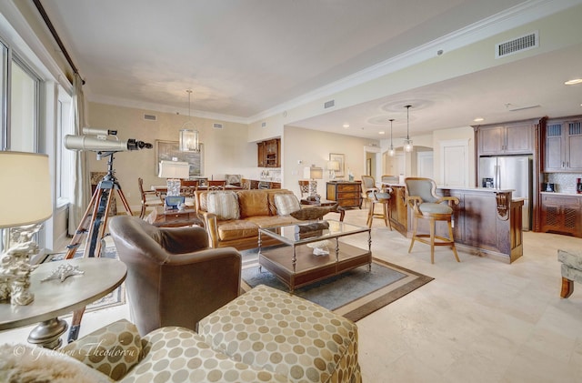 11807 Front Beach Rd Unit 2104, Panama City Beach, FL 32407 - living room featuring recessed lighting, visible vents, and ornamental molding