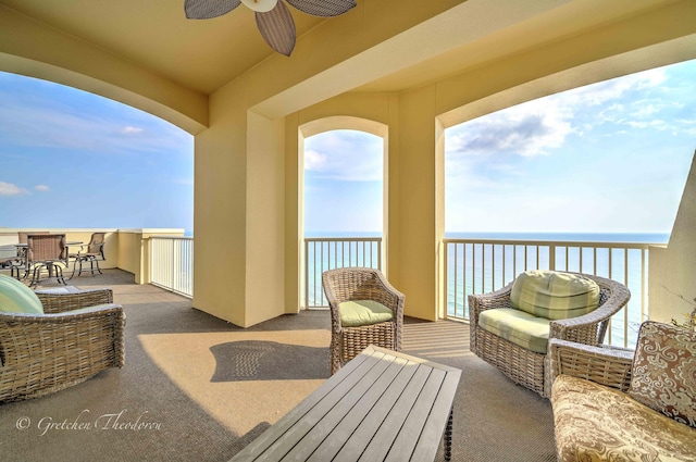 11807 Front Beach Rd Unit 2104, Panama City Beach, FL 32407 - balcony featuring outdoor dining space, a water view, and ceiling fan