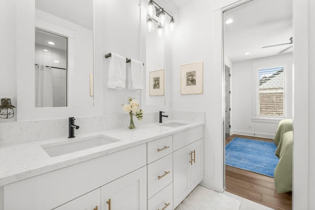 331 Ridgewalk Cir, Santa Rosa Beach, FL 32459 - full bath with recessed lighting, double vanity, wood finished floors, and a sink