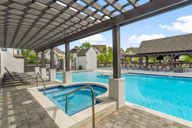 331 Ridgewalk Cir, Santa Rosa Beach, FL 32459 - community pool with a pergola, a community hot tub, a patio area, a gazebo, and fence