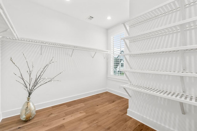 331 Ridgewalk Cir, Santa Rosa Beach, FL 32459 - spacious closet with wood finished floors and visible vents