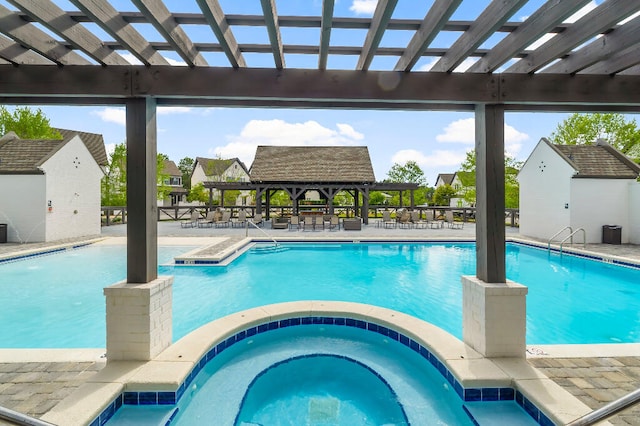 331 Ridgewalk Cir, Santa Rosa Beach, FL 32459 - community pool featuring a pergola and a hot tub