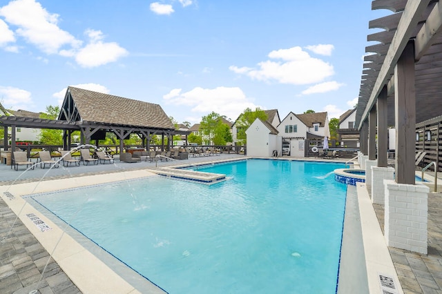 331 Ridgewalk Cir, Santa Rosa Beach, FL 32459 - community pool featuring a gazebo, a hot tub, a patio area, and a pergola