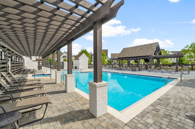 331 Ridgewalk Cir, Santa Rosa Beach, FL 32459 - community pool with a pergola, a patio, and fence